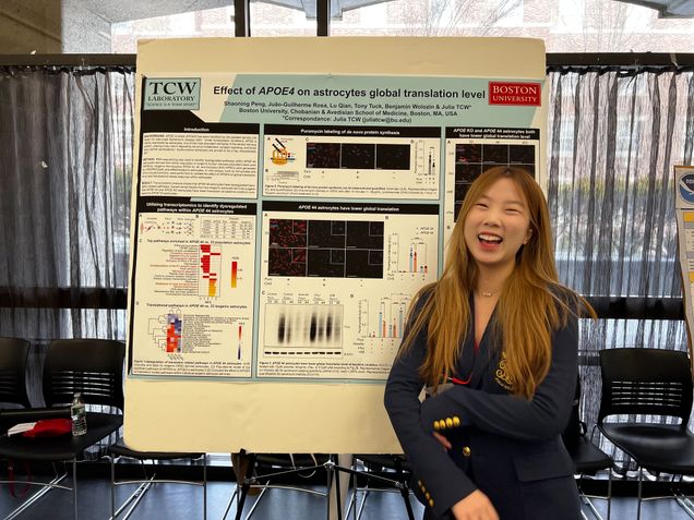 TCW Lab member with poster presentation